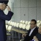 Colonel salutes Sharon and flag
